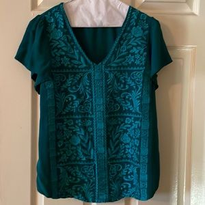 Green embroidered shirt
